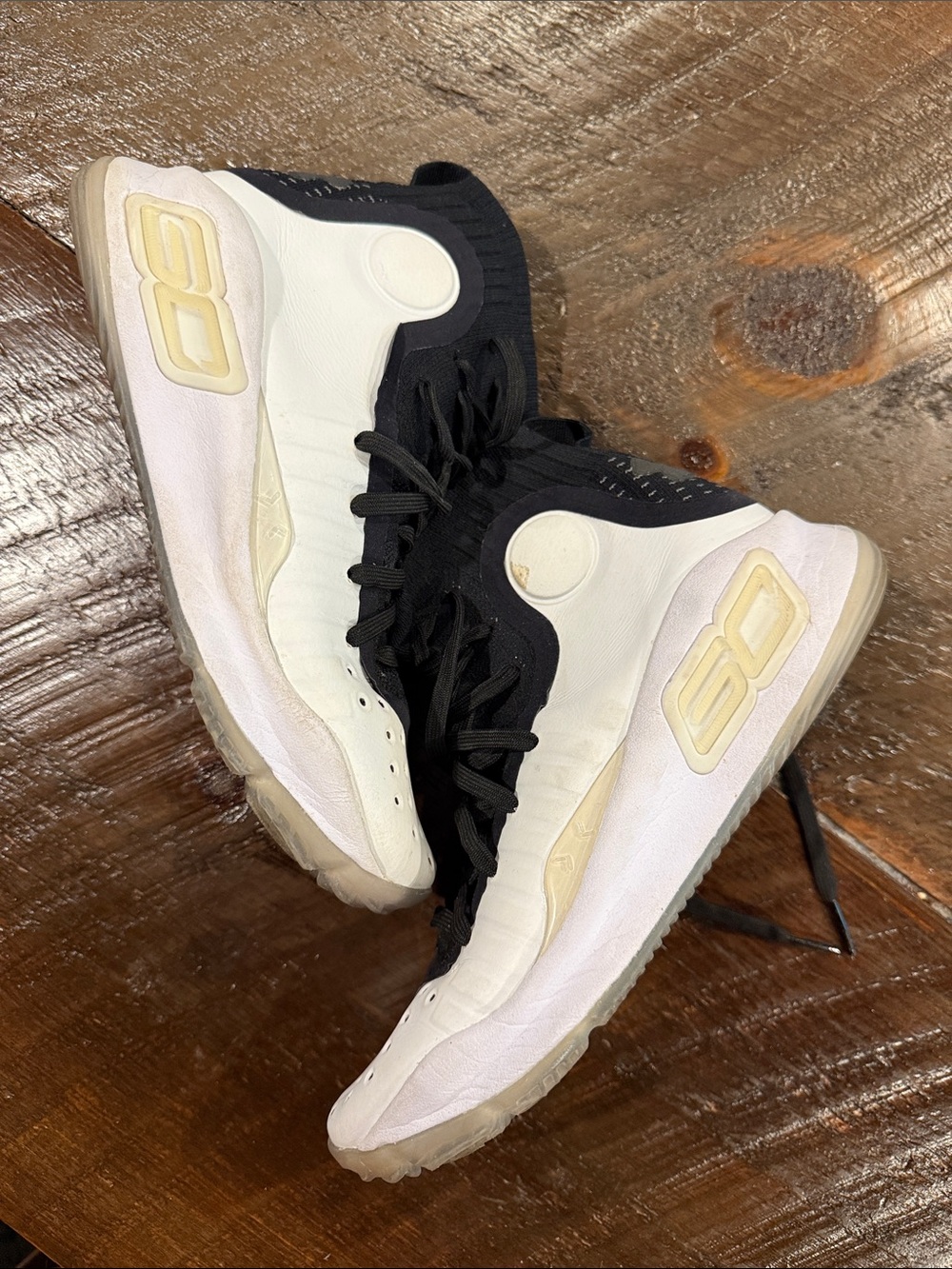 Under Armour Kids Black and White High-Top Sneakers- curry’s
